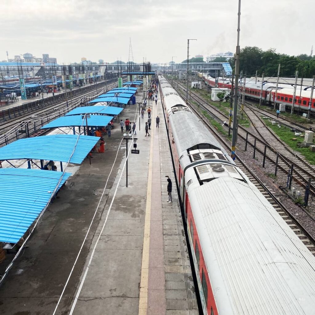 Train waiting at a railway station platform in India