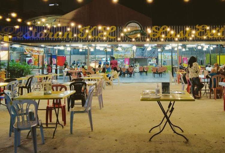 Open-air mamak restaurant at night in Kuala Lumpur